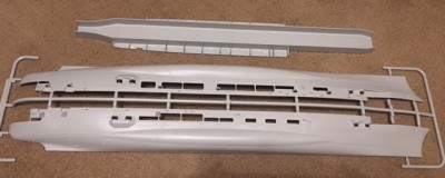 IMG_0982.JPG (70.5 KiB) Viewed 9293 times The two hull halves and the hangar deck.<br />Detailing is very nice, crisp and clean, it does not appear that there will be a lot of cleaning.