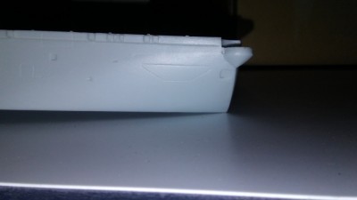 Stern of the hull touching the table.