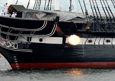 US_Navy_090704-N-1928O-022_USS_Constitution,_the_world's_oldest_commissioned_warship,_fires_a_portside_cannon_during_a_21-gun_salute_in_Boston_Harbor_during_4th_of.small.jpg