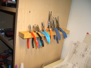 First get all the pliers off the worktop and in place
