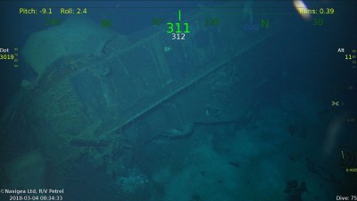 These are the 5" guns on the starboard aft side of the ship. It has collapsed and the flight deck now sits vertically. You can see the wood decking that was on the flight deck.