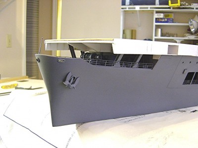 Good shot of the bow, portside. Bow was shaped from autobody filler. Bulwark is thin styrene. Took me a while to get the shape correct. Note the anchor winch, cast metal consisting of 10 separate parts. Chain is brass.