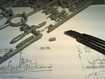 Cut a small strip of runner, cut and trim it to turret's shape.