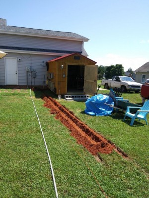 Resized Beginning the trench.jpg