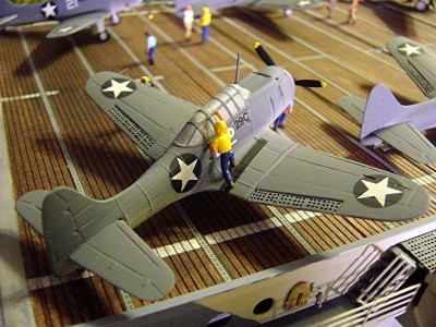 DSC02938.JPG (195.98 KiB) Viewed 4872 times Here's one of the SBD dive bombers. All the aircraft are resin kits from JR Haynes from the UK. There are 9 -10 pieces in the kits and consist of some cast metal parts such as the props, landing gear and the cowling. It also comes with the national insignia. I added the radio antenna, pitot tube, and some bombs and bomb racks under the wings. I have also drilled out the dive flaps.