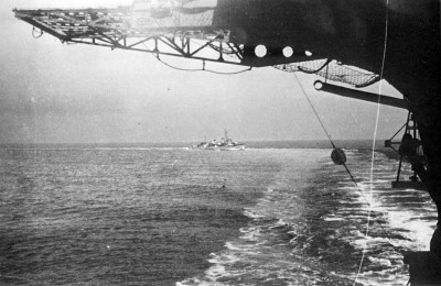 aft safety netting on Shokaku, (training in Tokyo Bay, DD Arashi is plane guard) March 18, 1943 by Yasuo Horiuchi.jpg
