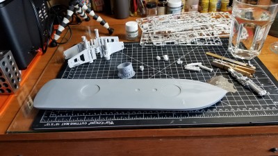 The hull with noticable splotches of Mr. Surfacer. The printed turret is not for Chickasaw, but rather another project, the USS Monitor, in 1/200 scale; basically testing my printer. The X-Wing in the background is the in-progress 1/72nd scale Bandai kit.