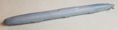 20210116_001428 (2).jpg (104.48 KiB) Viewed 4354 times Once I finished scribing the missile tube doors, I applied primer in the area of the turtleback, which really made the remaining defects visible.