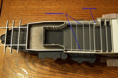 Trumpeter incorrectly tapered the upper level of the boxy structure forward of the elevator.  This will be replaced later.