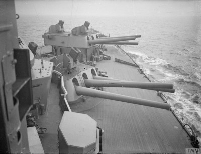 16_inch_gun_turrets_and_Unrotated_Projectile_launchers_on_HMS_Nelson_1940_IWM_A_1994.jpg