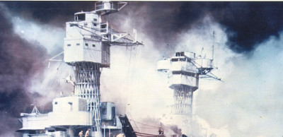 USS West Virginia sunk and burning mid-attack.jpg