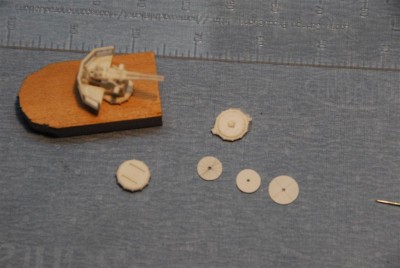 Here is two carrige bases and the three disc for the ring mount.  these parts bring the loader's rail to the correct 68" above the deck.