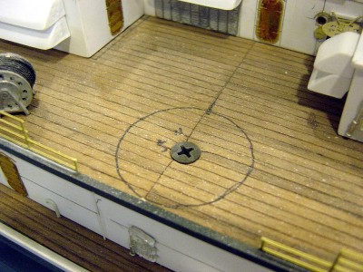 One of six mounting screw locations for the superstructure to be reattached in its exact position. These will be hiiden. Note how they are countersunk a little.