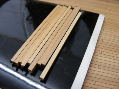 1. Planks cut to length placed od sticky back CG plastic (Large).jpg