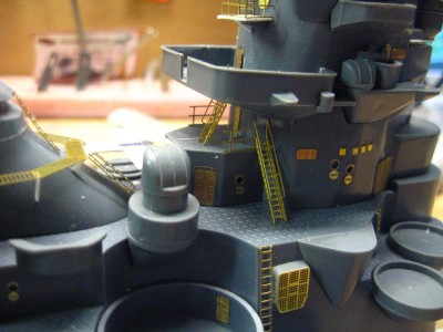 I like the look of the inclined ladder, but I have not seen anything that suggests it should be there