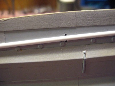 holes drilled with a # 70 bit for the securing cables