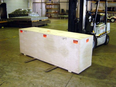 Heres the Indiana in her crate, ready to be loaded. Much easier with a forklift truck. We are at the FedEx facility in Jacksonville, Fla.