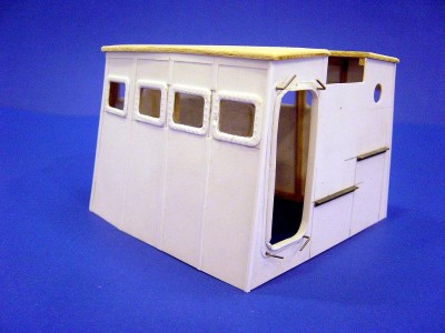 DSC03714.JPG (152.92 KiB) Viewed 20049 times Portside view here. Note the dogs for the W/T door, made from .030 steel wire. Rivet pattern around ports more visible here.