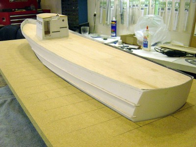 DSC03740.JPG (154.76 KiB) Viewed 20029 times Portside aft, looking fwd. Again note the rubrails. Deck is 1/16" sheet balsa. I will cover this with 1/32" scribed basswood,to simulate the plank lines at 1/8" spacing, then add the camber to the deck using 1/8" balsa stick. More on that later.