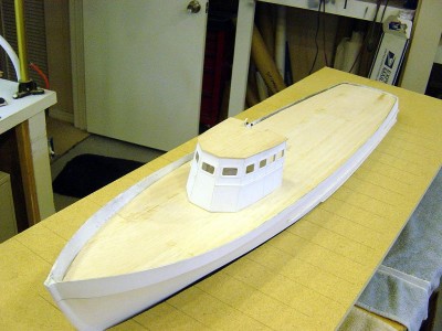 DSC03743.JPG (144.03 KiB) Viewed 20029 times Portside overhead view. Note the boat does not fit tight into the base as I want to be able to adjust it slightly as I begin the model the water.