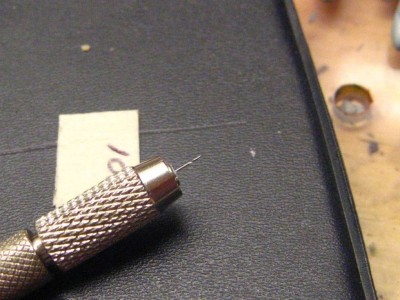 # 80 drill bitt and .025 mm fiber optics