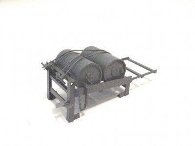 Another view here. Note the wrench hanging from small chain. This was used to set the detonation depth for the charges. Also note the extension to the right of the main rack. These folded up during normal operations, and were lowered for an attack run so charges would clear the hull.