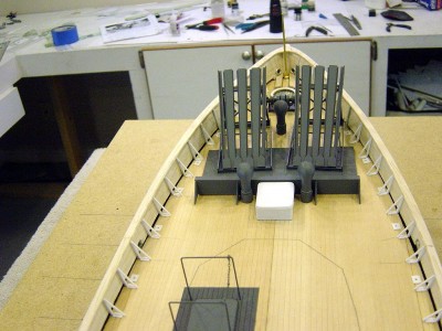 All bulwark supports now installed as well as the bulwark cap. Here you can see the relative positon of the mousetraps. I have also added the winch, some vents and other details.