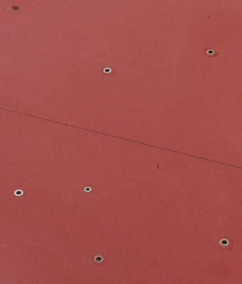 Reinforcements around the circular openings.