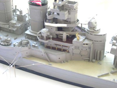 The bridge has newly painted 'booms' and has quad 50 cal guns added