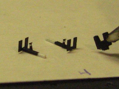 old shield on right, 2 new shields and cradles on left.  much better.