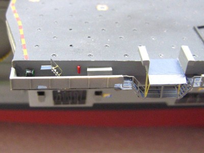 The nasty seam between the pe catwalk and the plastic bulkhead will be covered by life raft canisters, and some styrene if needed.