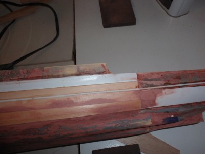 the bottom of the wood is faired  down and will not show when painted