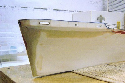 DSC04168.JPG (141.81 KiB) Viewed 4361 times Another view here. Bulwark is a tricky piece to do, even with .010 styrene. Difficult to get it to curve correctly in one piece, so I did it in three. Hull is made to be below the boot topping a little bit to show some red hull, when finished. You won't see much red depending on the water action. Anchor hawses and anchors yet to be installed.