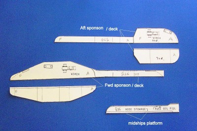 DSC04174.JPG (230.63 KiB) Viewed 4137 times I have transferred the drawings to poster board, then cut them out as shown here. These will be the patterns for the decks and the sponsons themselves.
