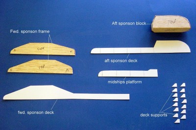 DSC04175.JPG (139.61 KiB) Viewed 4137 times Using the patterns, I have cut out the parts from the materials I'll be using here. Balsa for the sponsons, .030 styrene for the decks, platform and supports.