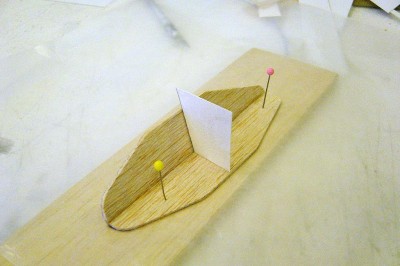 DSC04179.JPG (115.19 KiB) Viewed 4137 times I'll begin the forward sponson by gluing the back and the top together. Note the small jig used here to get the correct angle of the hull.