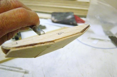 DSC04182.JPG (77.59 KiB) Viewed 4137 times Here I have added 1/16" balsa sheet between the back and the top sides to get the basic shape. I'll true this up a bit with 80 grit sandpaper before proceeding.