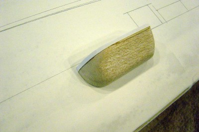DSC04190.JPG (99.67 KiB) Viewed 4137 times The aft sponson is a bit less complex in shape than the forward one. Here I have shaped a balsa block for the aft sponson, adding the styrene strip as before. Shown here in it's relative position along the hull.