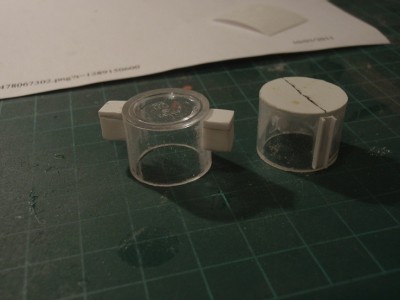 i used plastic continers that had cooking stuff in them,they were exactly the right dia. cut them with my jig saw