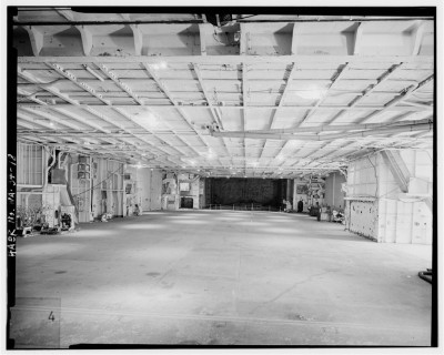 Post-war (ship in mothballs) photo of USS Hornet's <br />hangar deck looking forward.  Wartime appearance<br />is somewhat different.