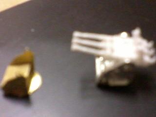 My camera phone is pathetic.  Brass GPM base, silver Ebay base and resin guns.