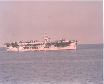 0302901.jpg (97.45 KiB) Viewed 39376 times Another view of the ship. SBD's, F4F's and TBF's on deck. Note the openings on the sides of the ship. This was the main deck of the tanker. Also note the weathering. Photo was taken enroute to North Africa during late October 1942.