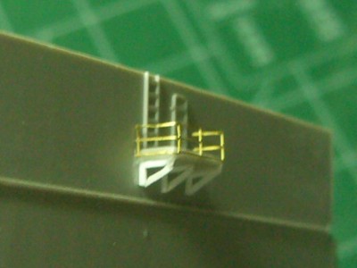 Here you can see the rails side mount, no stanchion on the corner, and the molded on door and ladder. I removed both, added a PE ladder, and some styrene tube to replicate the water storage tank fo the 50 cal guns