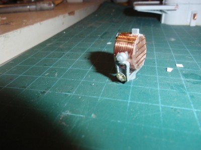 these 2 pics are painted,i think i am going to leave the copper unpainted adds a little contrast to a gray ship