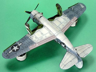 b4e8208e.jpg (127.35 KiB) Viewed 7340 times 1/48 SB2C-4 by Bob Laskodi in VB-3 (of Air Group 3) markings, Jan-Mar, 1945. Modelers note: Bob correctly shows the outermost flap's underside painted white. If you display Helldivers on your model with wings folded up, paint the wing undersides medium blue and the flap white.