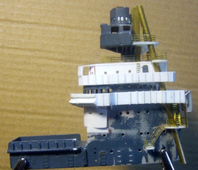 The port view. The box brace is installed and the last braces for the 8" director platform can be seen between the masts. And if you look close you can see the ladder to the fighting top but it's from the side and hard to see