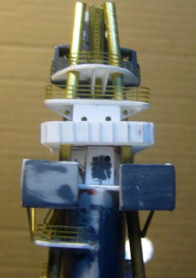 Here you can plainly see the braces for the flag level roof, the 8" director platform between the masts, and the ladder to the fighting top