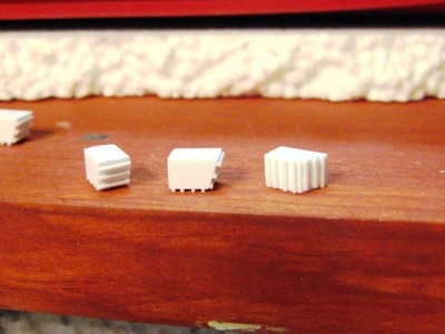 8 or 9 parts to each of these, plus a hatch and lights to be added.  I think moldign and casting would save me some future tedium.