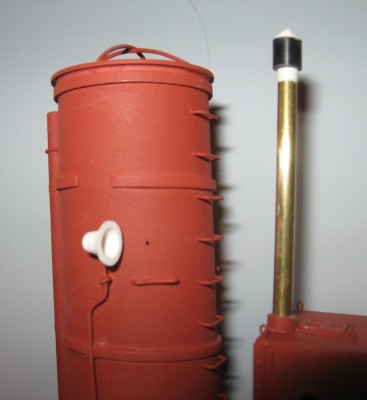 Adding the steam whistles and stove chimney. Small holes have been drilled for the funnel stay wires.