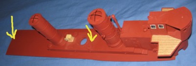 The deck structure is glued to the removable deck section. The holes for the two retaining bolts are indicted.